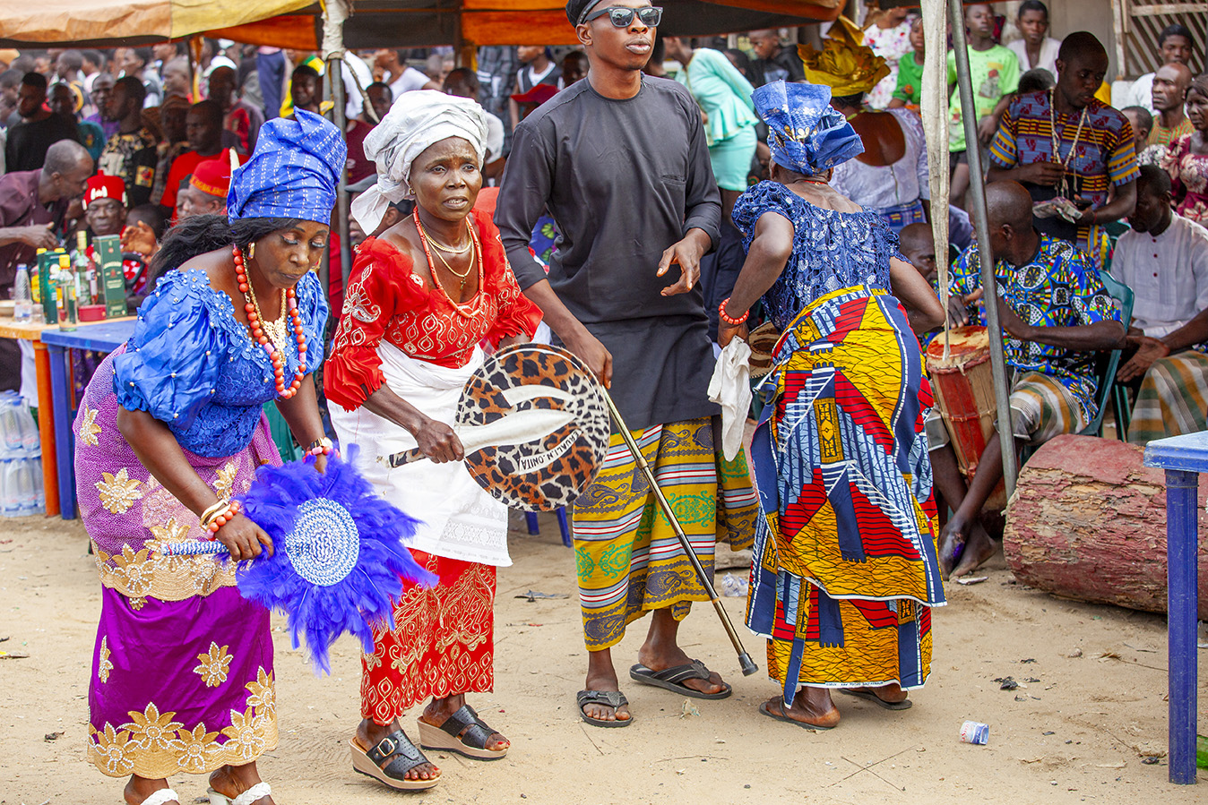 Elegantly dressed women dance to the rhythm