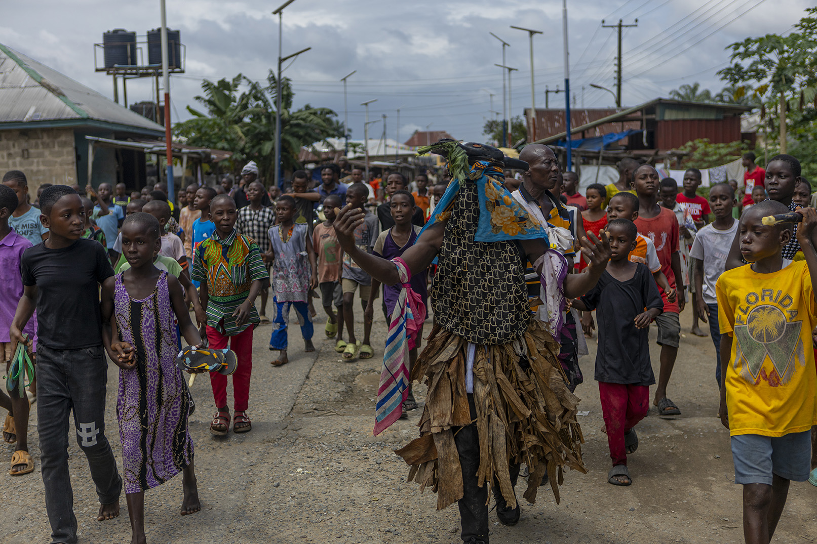 Ogoriba Masquerade parade the town with children  